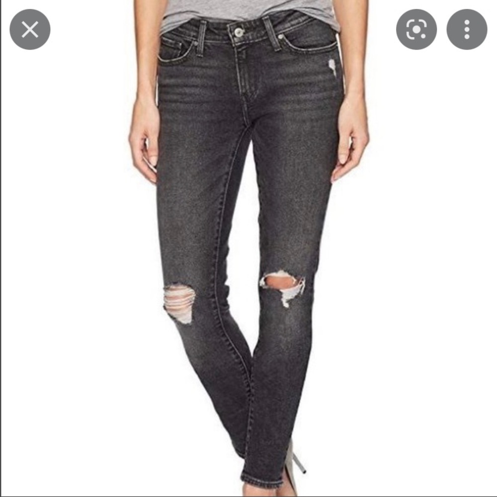 Levi’s 711 skinny jeans distressed and ripped in black